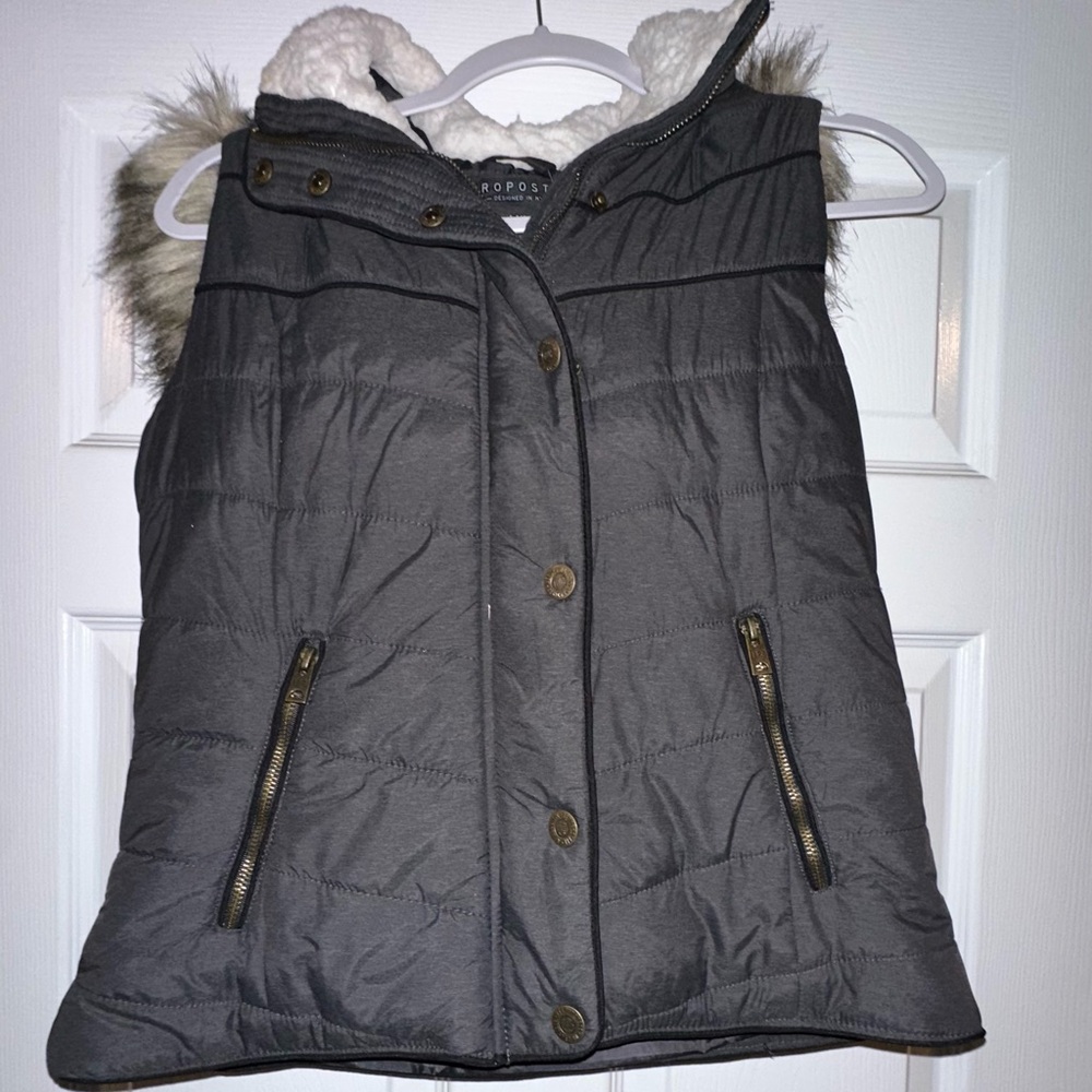 Gray puffer vest with faux fur trim